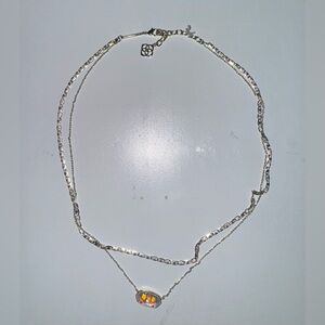 Elegant Silver Necklace with Orange Gem